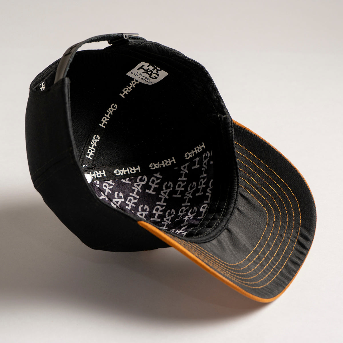 Gorra HRHG (negra y ocre)